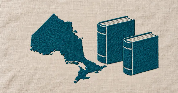Embroidered outline of Ontario next to two reference books